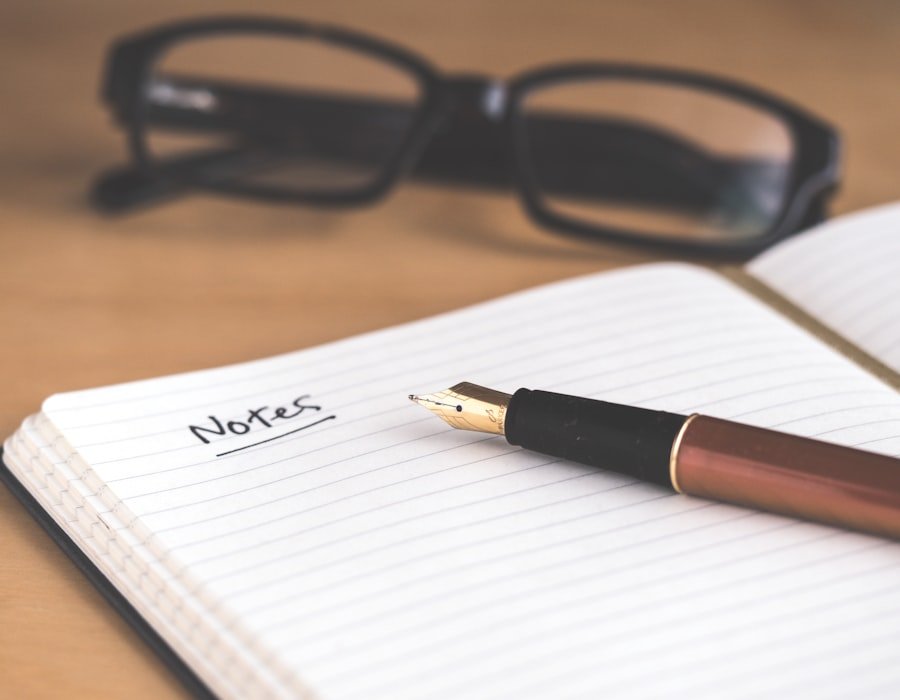 An evaluator's notebook and glasses, evidence behind every score